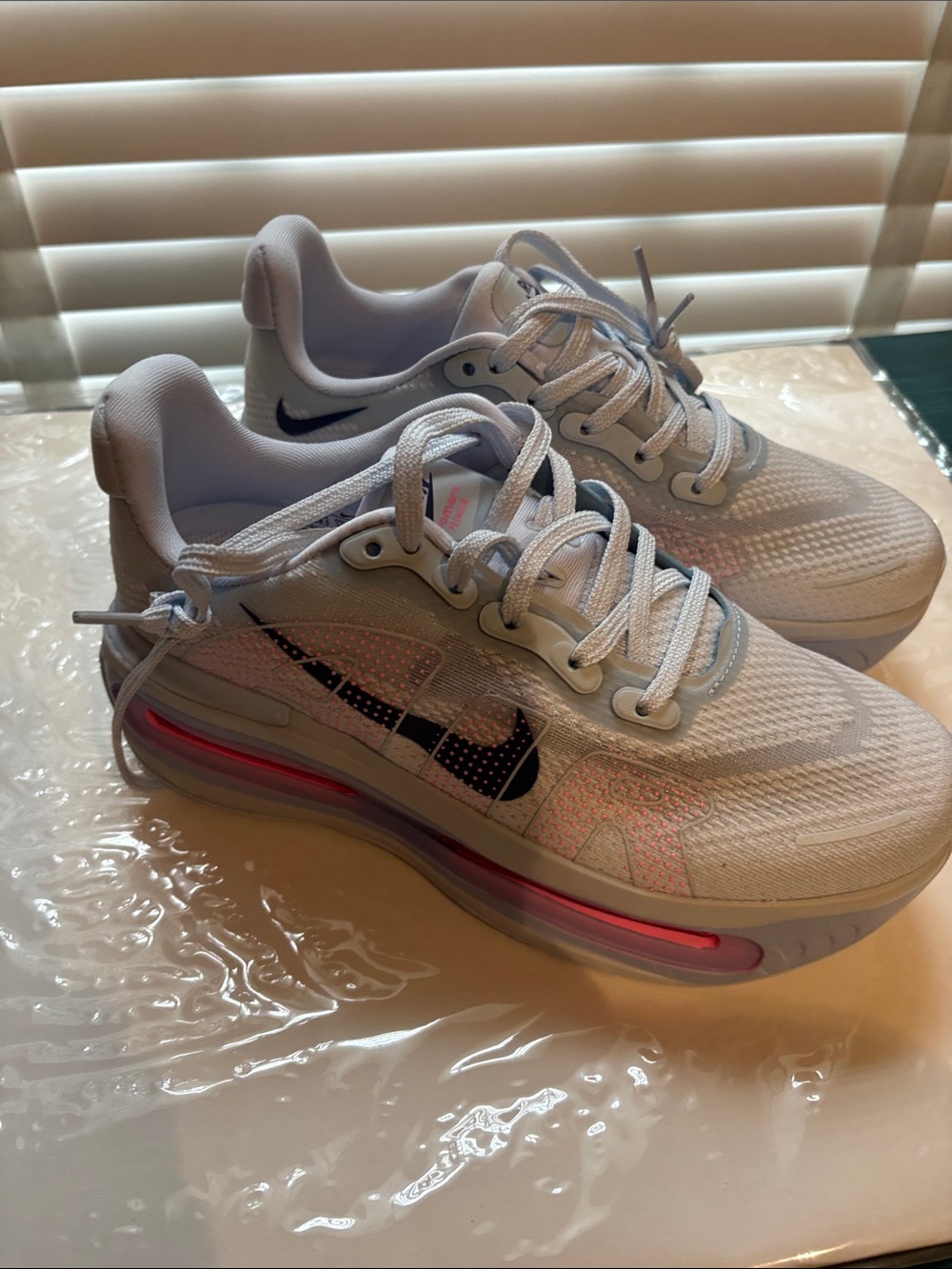 Nike Women’s sky blueand Pink Athletic Sneakers with navy blue Swoosh